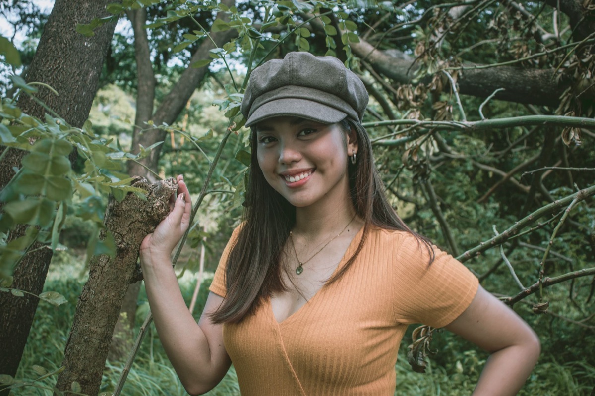 Filipino content creator in outdoor setting, natural environment, genuine interaction