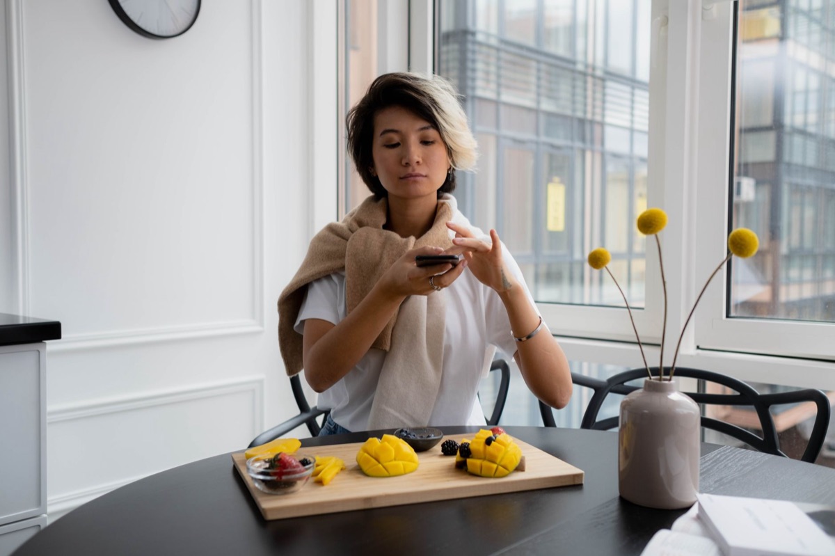 Filipino influencer in kitchen with healthy food