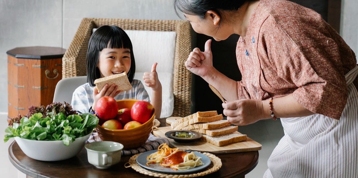 Filipino family eating healthy meal