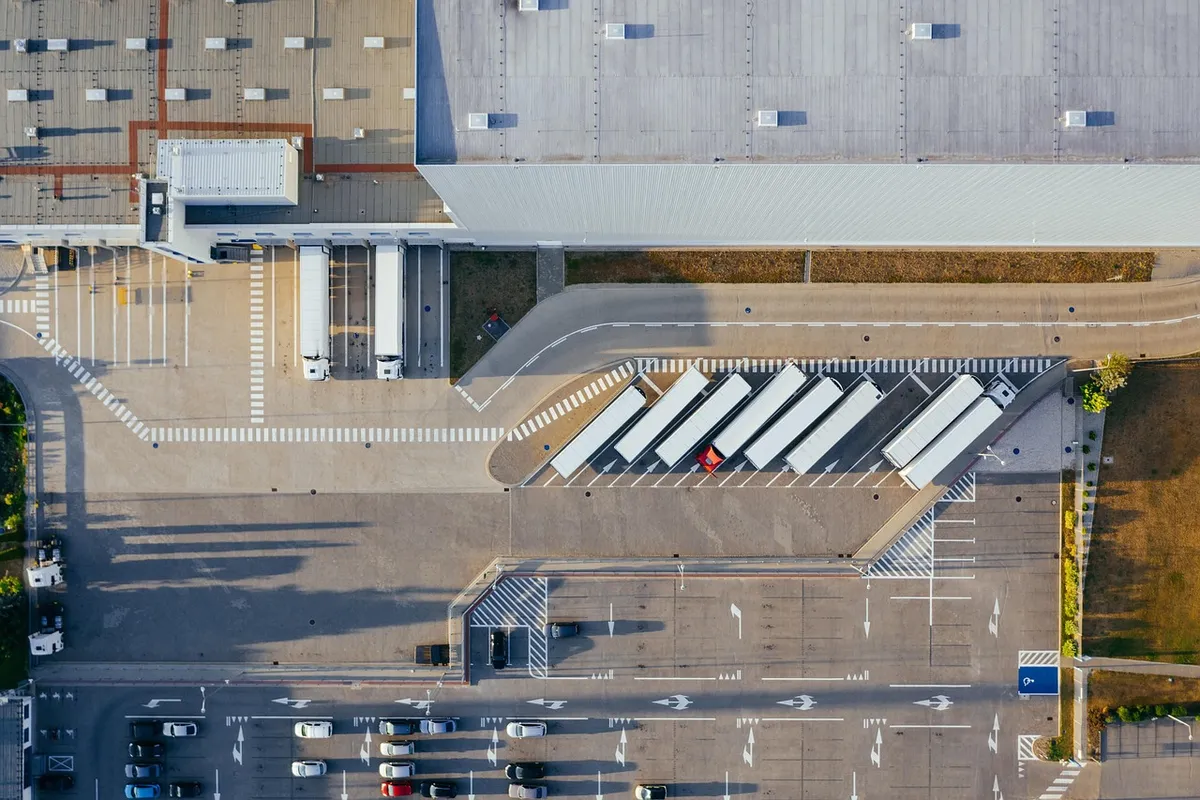 production, facility, logistic, distribution center, transit, truck, transport, top view, industrial, semi, aerial view, heavy, depot, germany, warehouse, conta